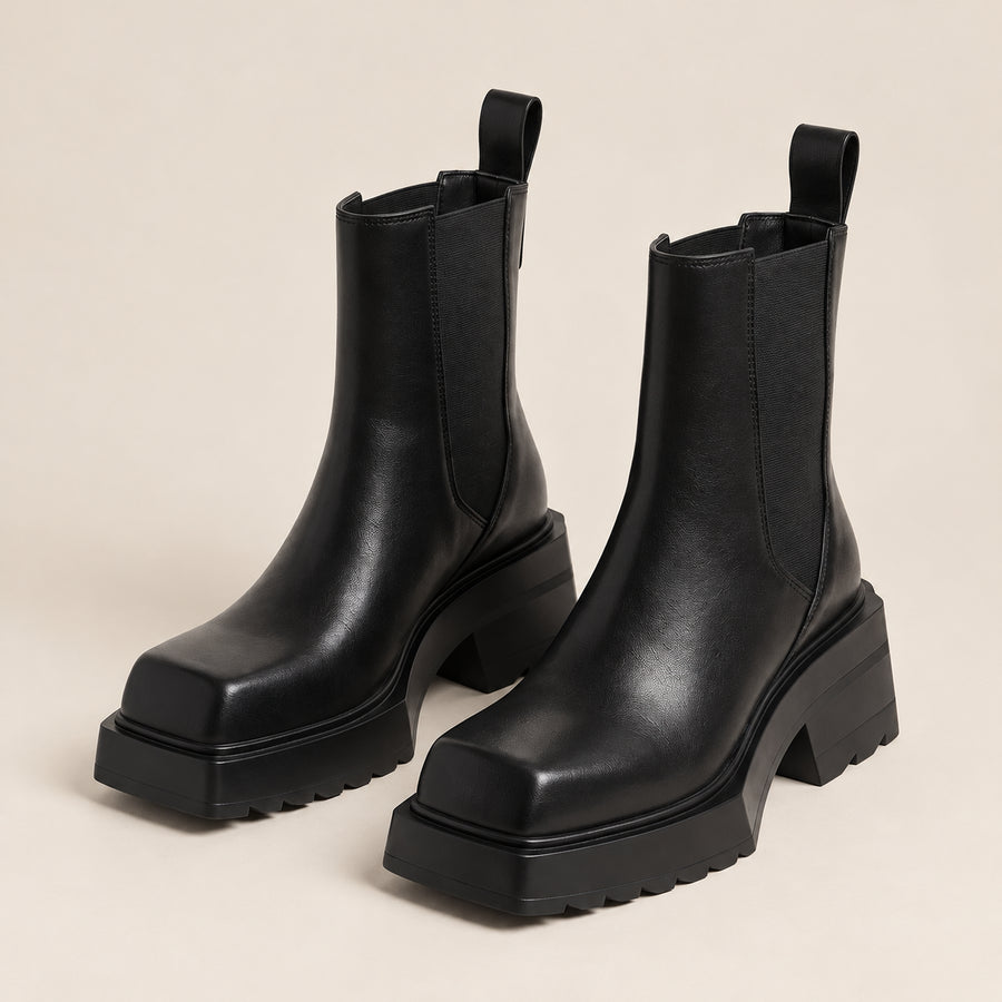 Bottines Chelsea Femme - Bout Carré Talon Bloc Effet Cuir - Noir - vue non portée sur fond beige