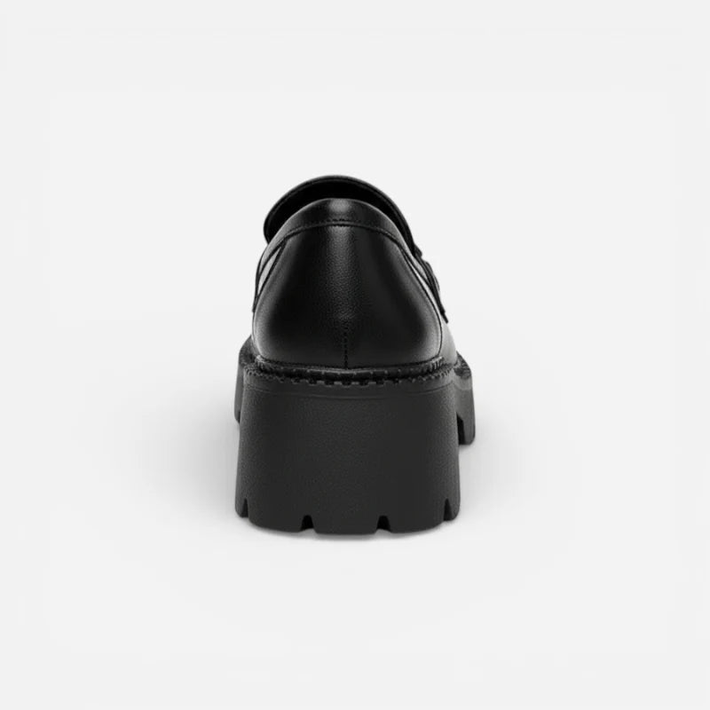 Vue arrière du mocassin plateforme en cuir mat noir pour femme