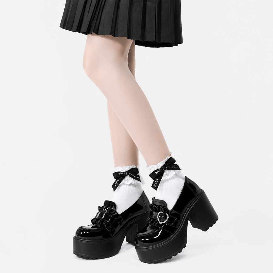 Mocassin femme noir - gros plan boucle en forme de cœur